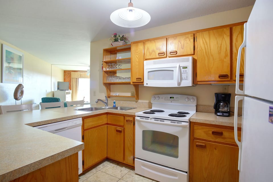 This cozy 1BR condo at Ocean Pines Resort features a fully equipped kitchen with modern appliances, offering a perfect space for couples or small families to enjoy coastal surroundings and the comforts of home.