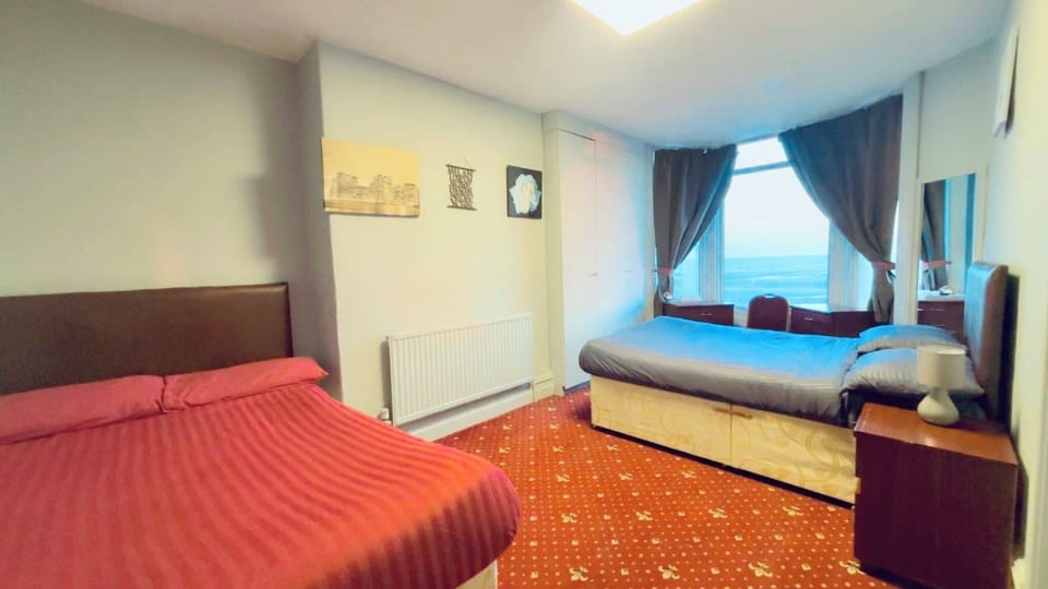 Desk, laptop workspace, free WiFi, bed sheets