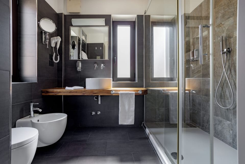 Double or Twin Room | Bathroom | Shower, rainfall showerhead, eco-friendly toiletries, hair dryer