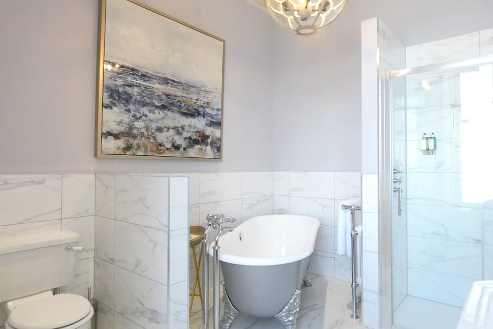 Luxury Suite, Sea View | In-room safe, iron/ironing board, free WiFi