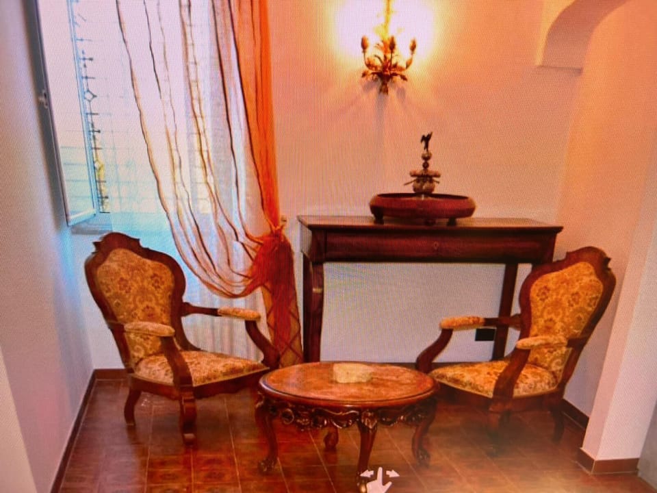 Superior Triple Room, Garden View | Living area | TV