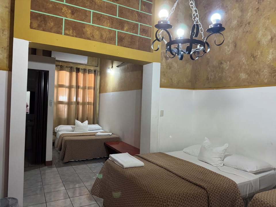 Family Quadruple Room | Laptop workspace, iron/ironing board (on request), WiFi (free)
