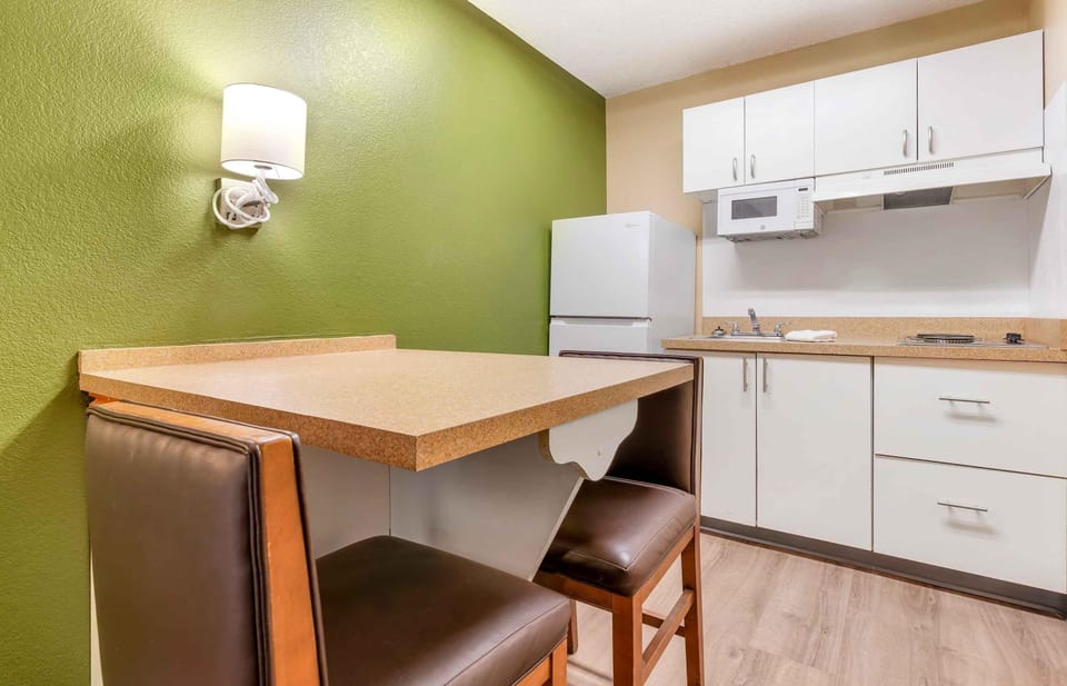 Deluxe Studio, 1 King Bed with Sofa bed, Non Smoking | Private kitchen | Full-size fridge, microwave, stovetop, coffee/tea maker