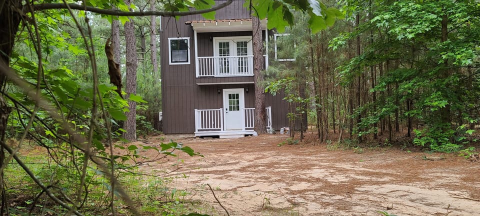 This is the outside of the Bath House in the Piney woods. Great Honeymoon place