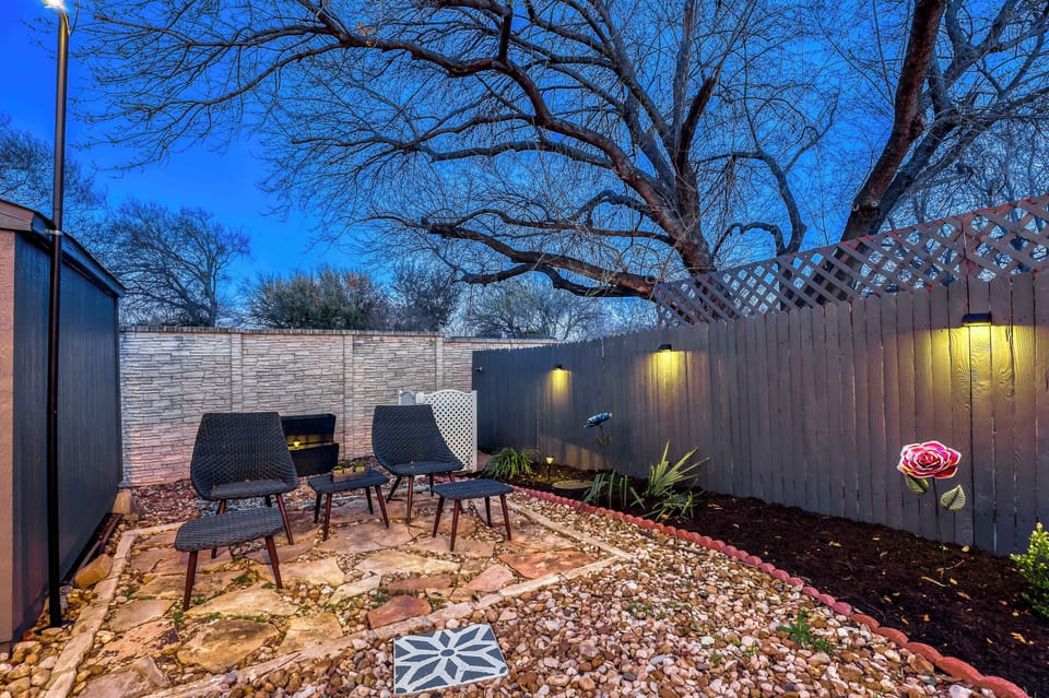 Inviting outdoor lounge with decorative lighting and relaxed backyard vibe