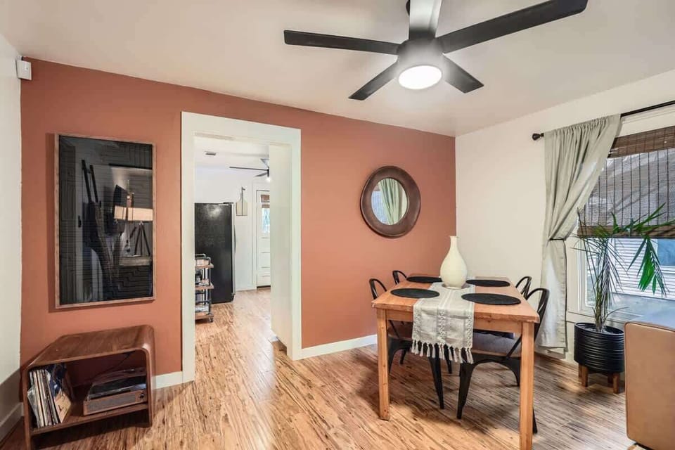 A cozy dining area to enjoy meals, games, or a glass of wine together.