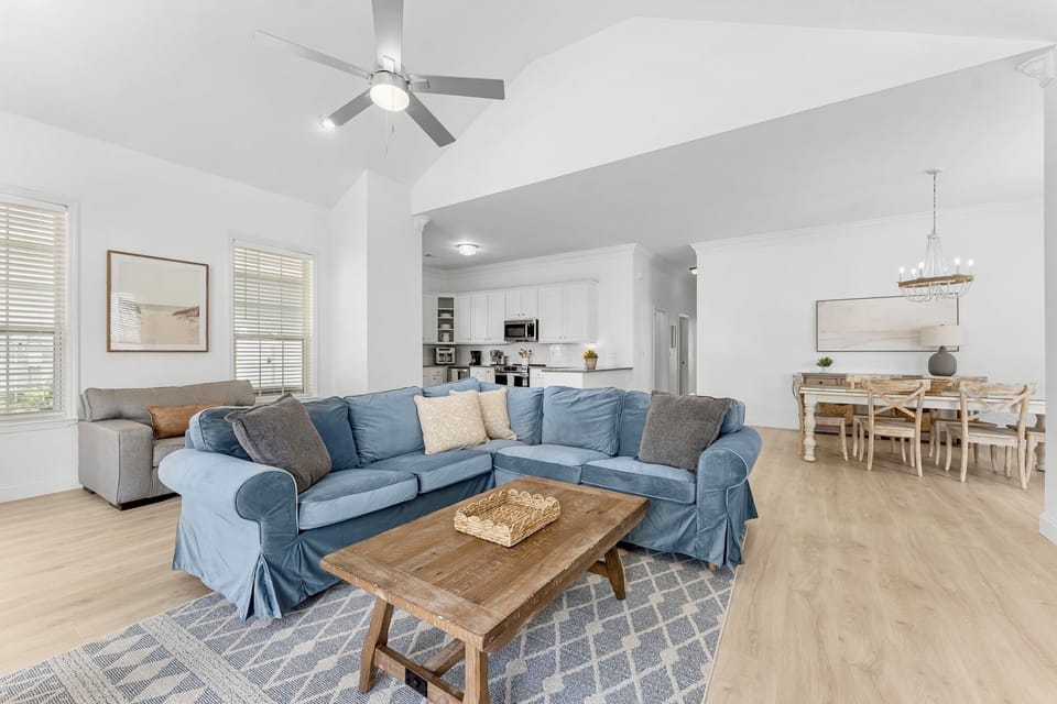 Living room: Tons of natural light with an open concept floorplan and Smart TV 
