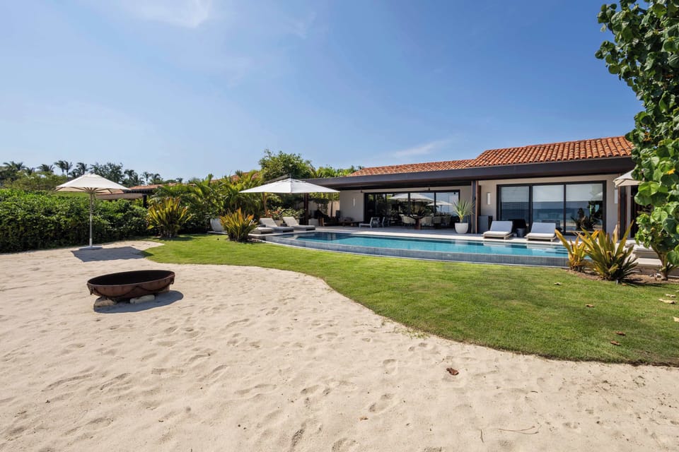 Oceanfront pool with lounge seating