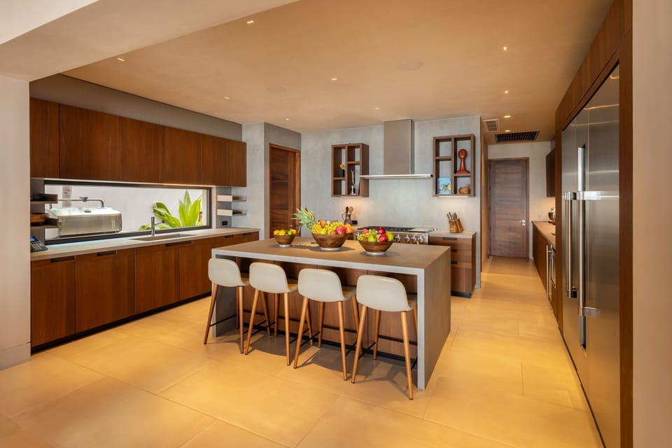 Cook like a pro in this fully equipped beach house kitchen with modern appliances.