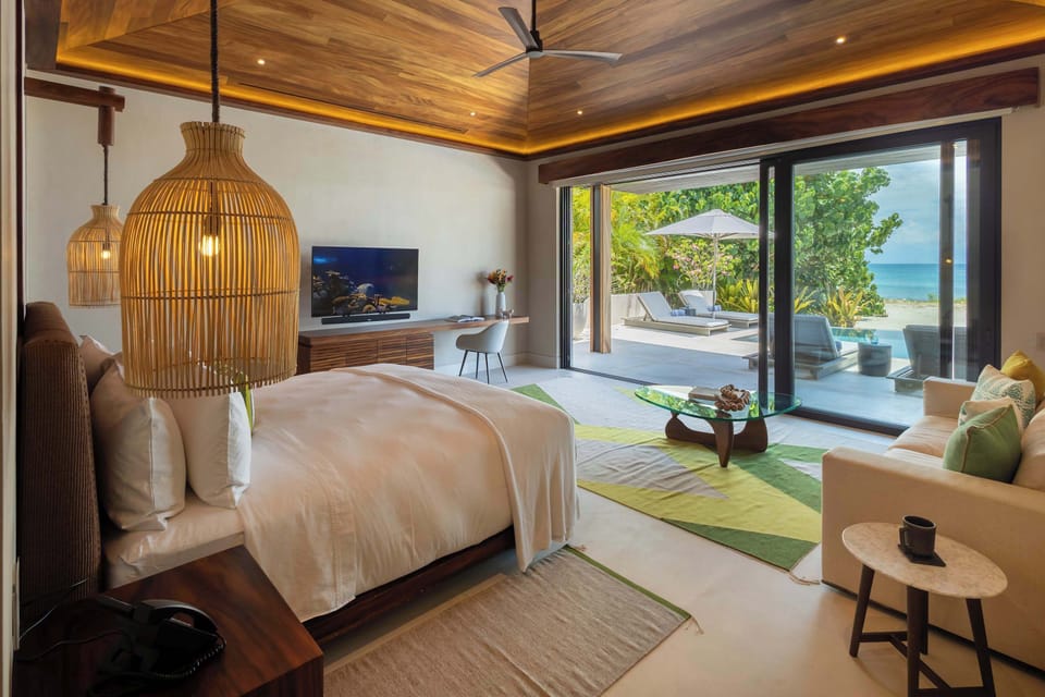 Wake up to stunning ocean views in the master bedroom with a king-size bed.