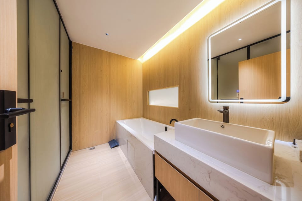 Signature Double Room | Bathroom | Shower, hair dryer, towels, soap