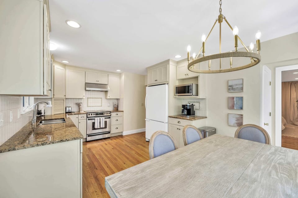 Gather around this inviting table, just steps from the kitchen and backyard patio.