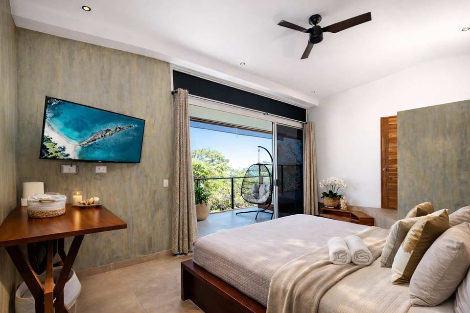 Bright Ocean-View Bedroom with Private Balcony Access, Queen Bed & Modern Coastal Design for a Relaxing Tamarindo Stay


