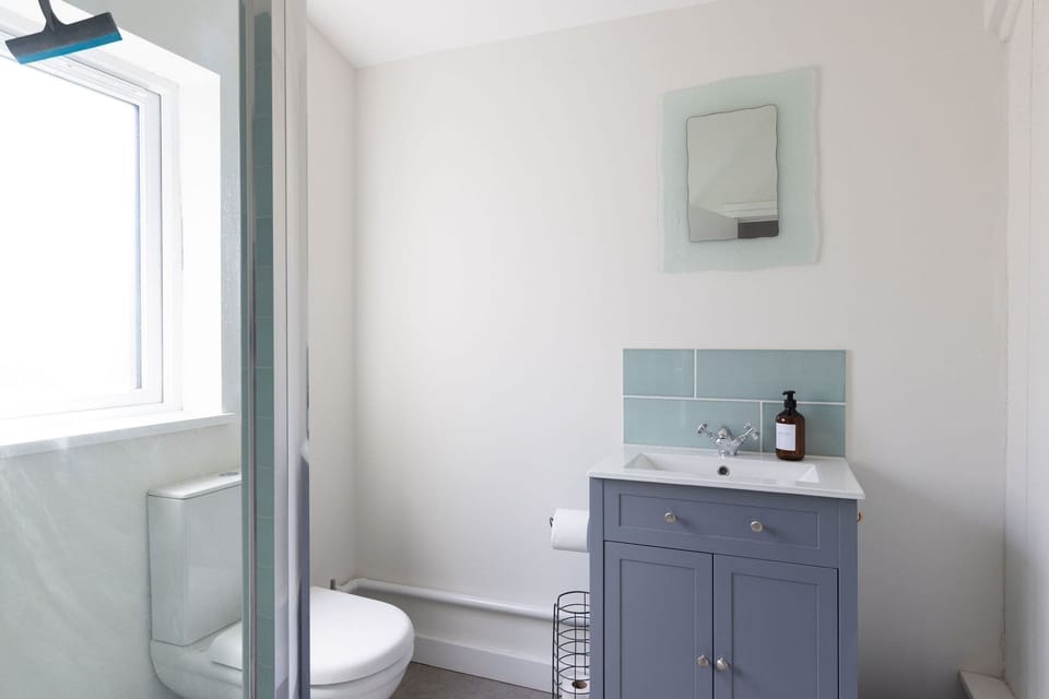 Bright bathroom with walk-in shower