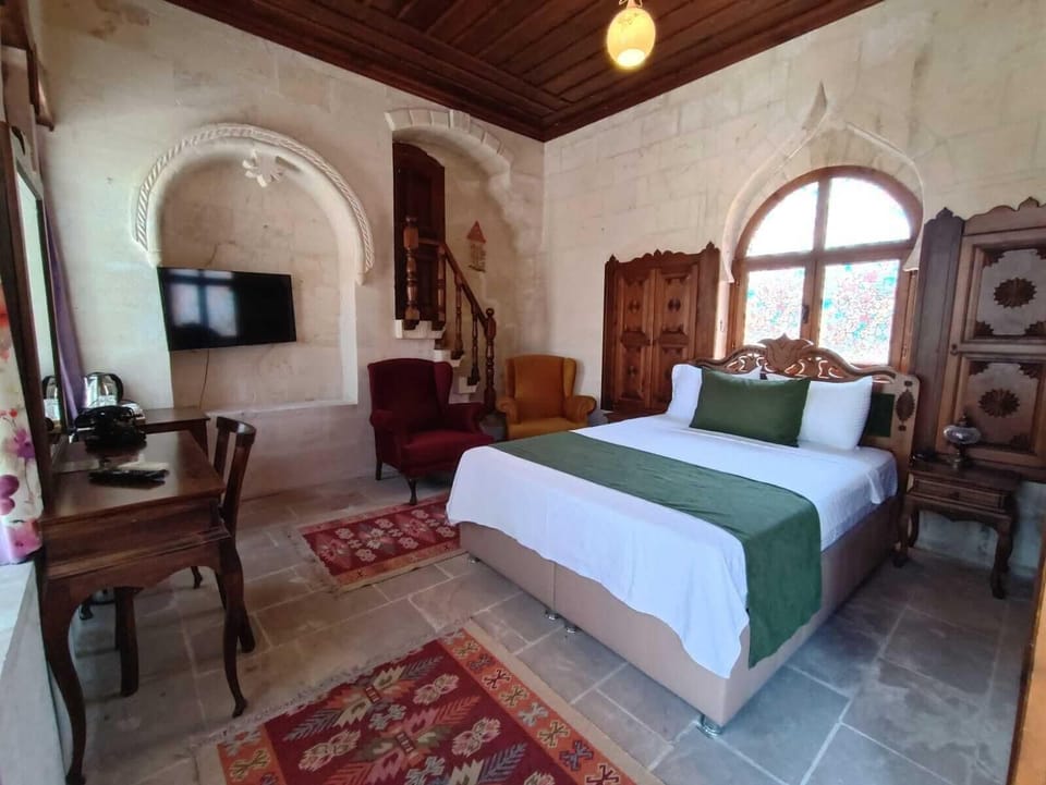Deluxe Double Room, Courtyard View | Iron/ironing board, free WiFi, bed sheets