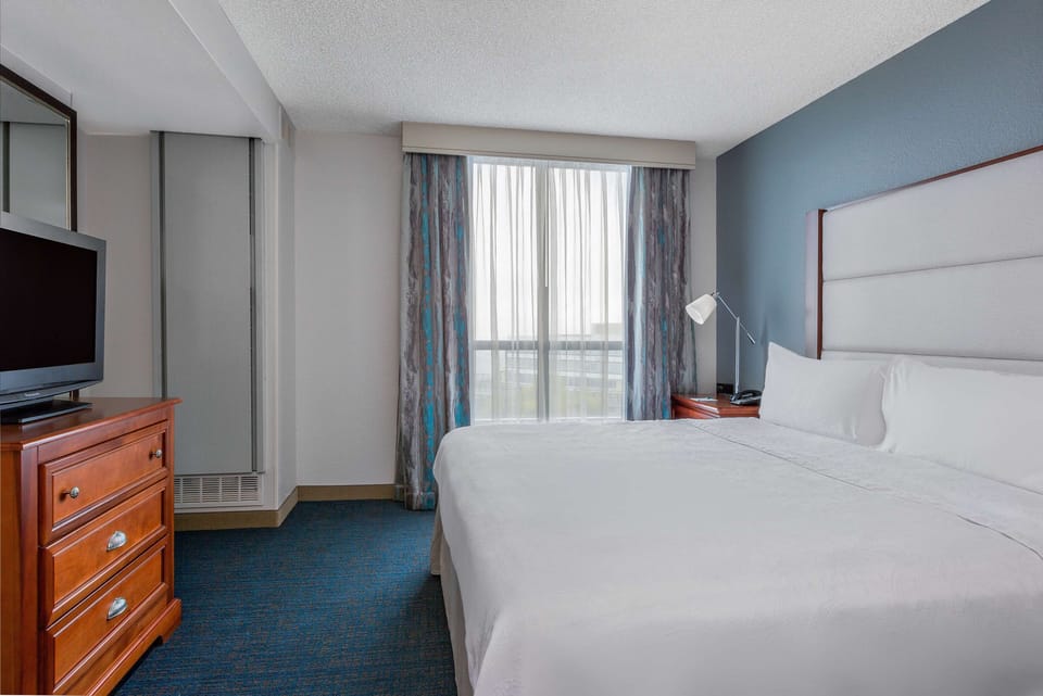 Suite, 1 Bedroom, Bay View (1 King Bed with Sofa Bed) | Desk, iron/ironing board, free WiFi, bed sheets