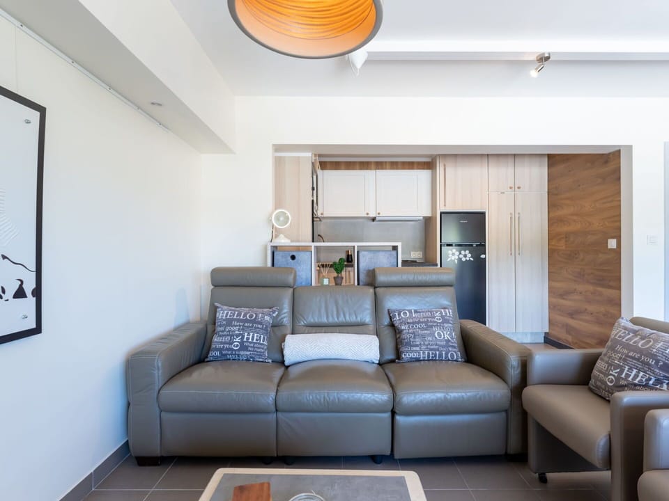 Furniture, Interior Design, Flooring, Couch, Wall, Floor, Wood, Room, Ceiling, Living Room