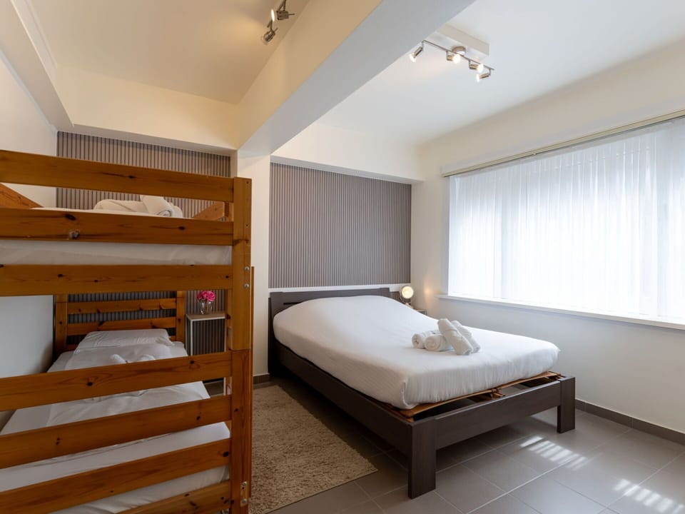 Bed, Interior Design, Furniture, Bedroom, Floor, Flooring, Wood, Ceiling, Bedding, Bed Sheet