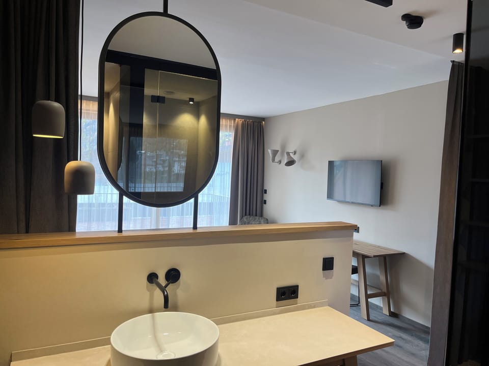 Shower, hair dryer, bathrobes, towels