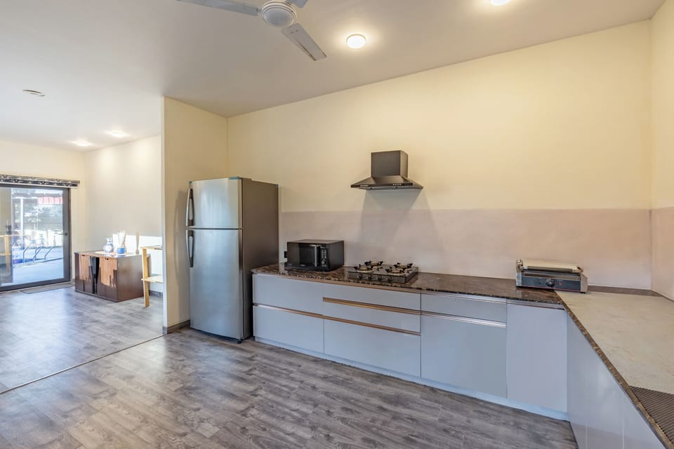 Fridge, microwave, cookware/dishes/utensils