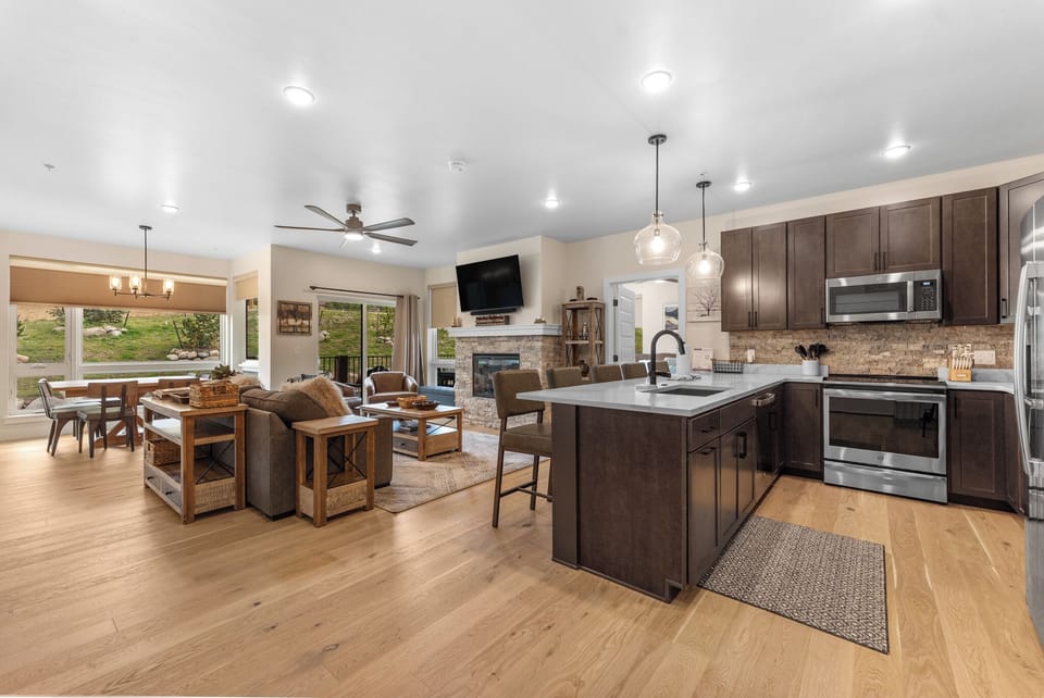 Your spacious open-concept kitchen flows seamlessly into the living area, perfect for cooking and entertaining together.
