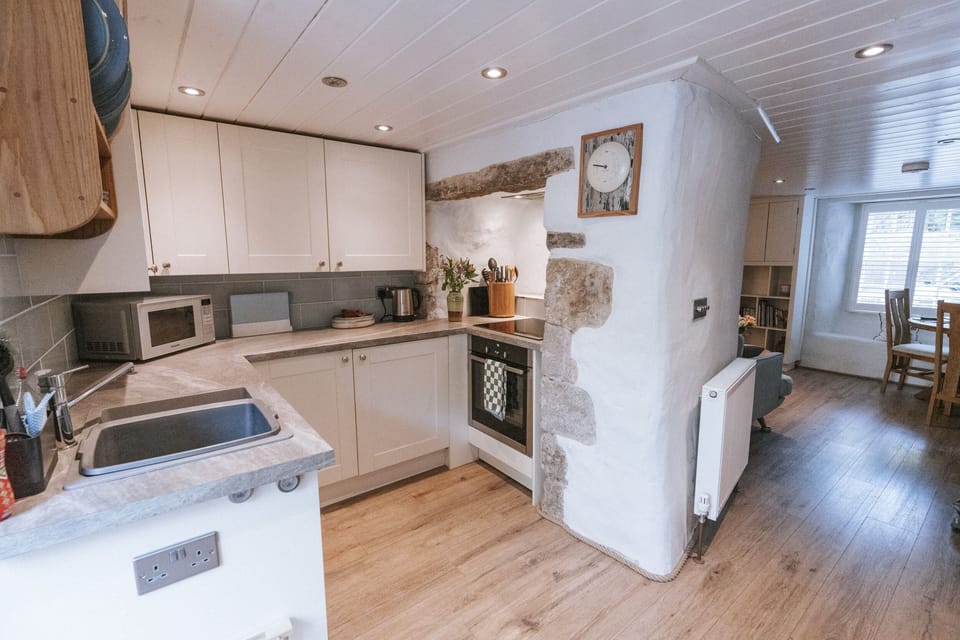 Fridge, microwave, cookware/dishes/utensils