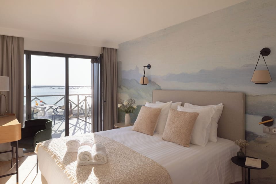 Comfort Double Room, Patio, Sea View | Premium bedding, in-room safe, desk, blackout drapes