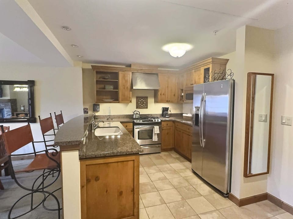 Kitchen and bar seating | Listed with @BookTraverse