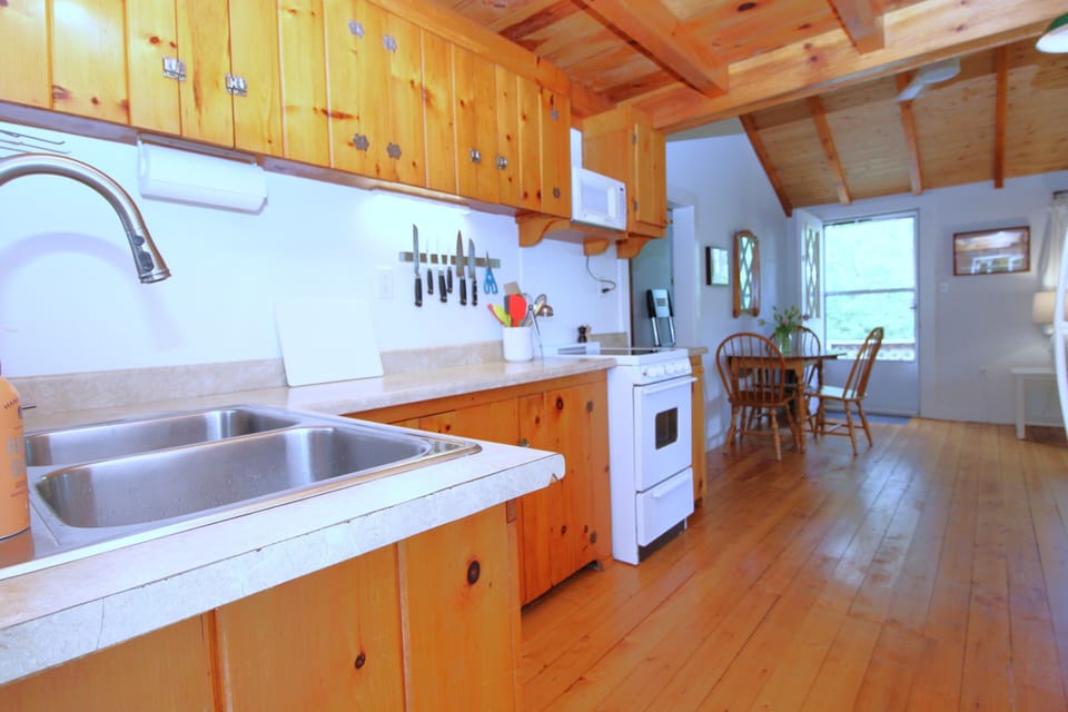 Kitchen with Didning in Background