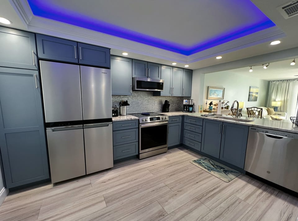 Upon entering you are greeted by the beautifully updated and ful - Upon entering you are greeted by the beautifully updated and fully equipped kitchen. Complete with everything you'll need from your morning coffee to your midnight snack.