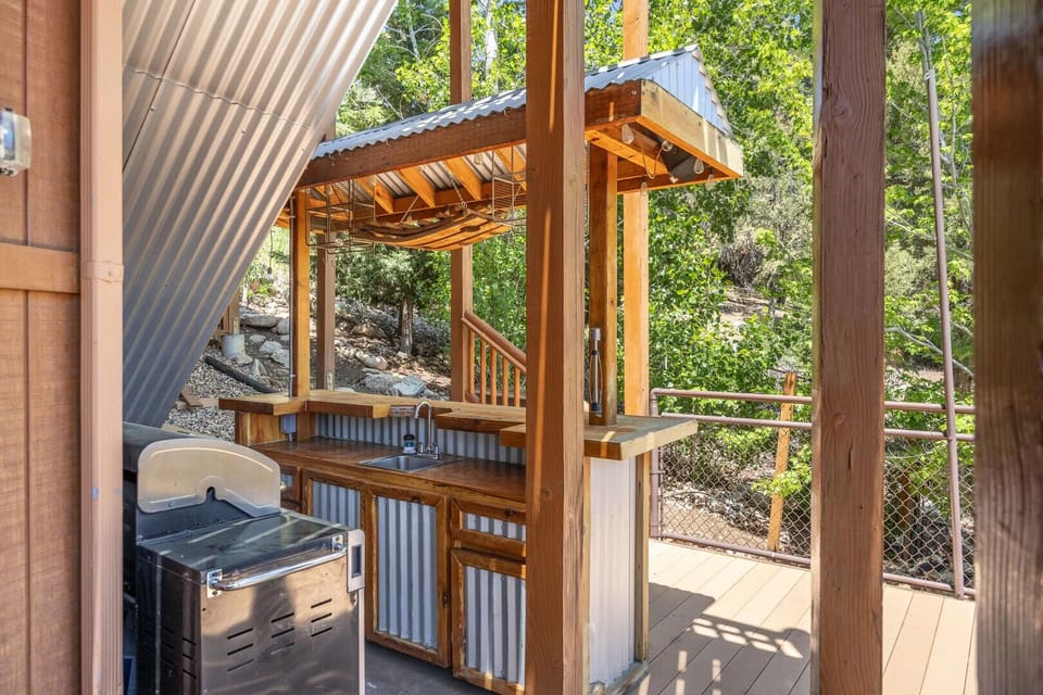 Bottom Deck - Bottom Deck
BBQ – Propane
Tiki Bar with outdoor Kitchen and Sink
Horse Shoes