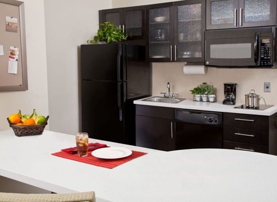 Desk, iron/ironing board, cribs (free), WiFi (free)