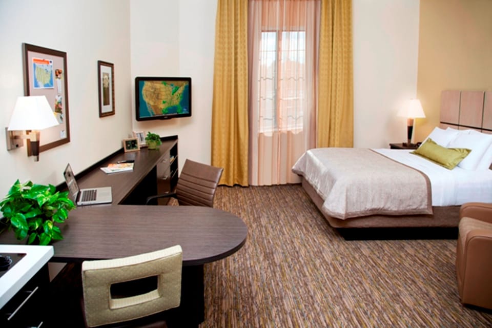 Desk, iron/ironing board, cribs (free), WiFi (free)