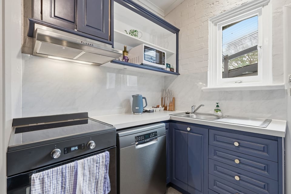 A full-sized oven, stovetop, and generous counter space make preparing meals a breeze.