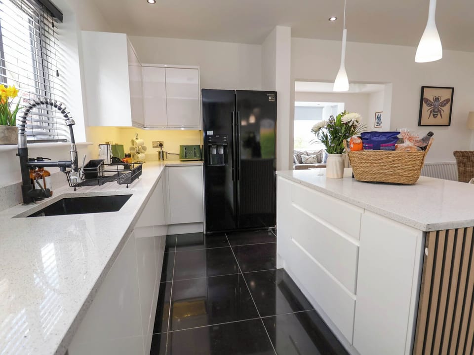 Fridge, toaster, cookware/dishes/utensils