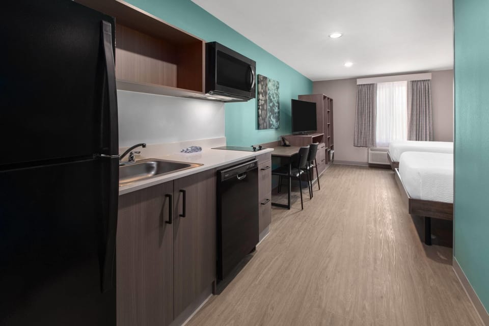 Suite, 2 Queen Beds, Non Smoking | Desk, laptop workspace, blackout drapes, WiFi (free)