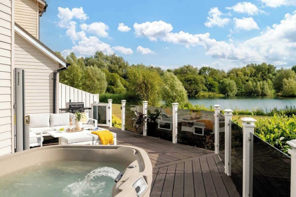 Your private hot tub, with front-row seats to the lake and zero reason to rush.