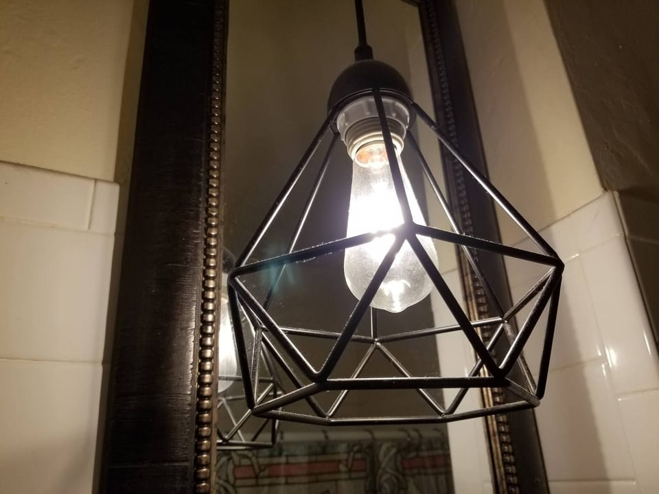 Cool light fixture in bathroom