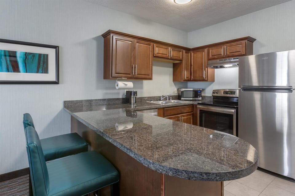 Suite, 1 King Bed, Accessible, Kitchen (with Sofabed) | Private kitchen | Coffee/tea maker, fridge, microwave