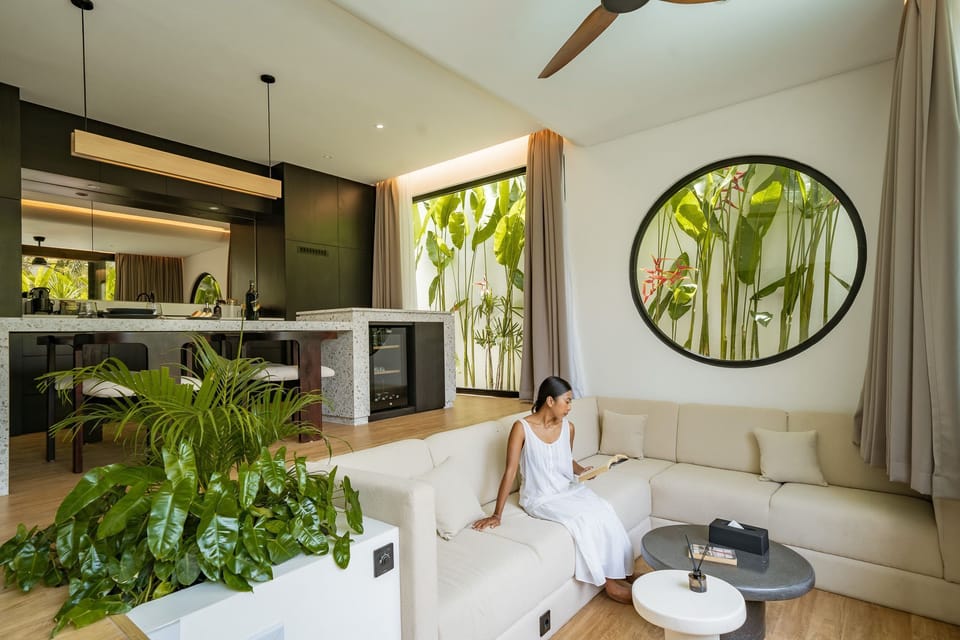 Deluxe Villa, 2 Bedrooms, Patio, Pool View | Living room | 65-inch TV with cable channels