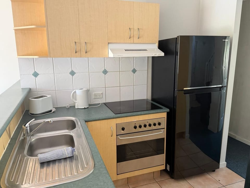3 Bedroom Apartment | Private kitchen | Full-size fridge, microwave, oven, stovetop