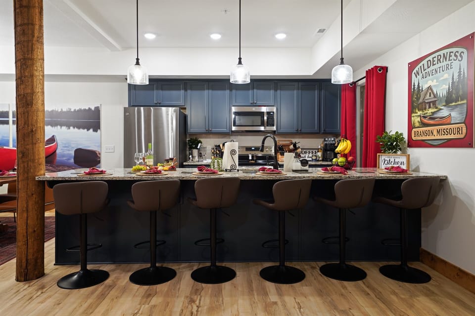 Fully stocked kitchen with stainless steel appliances