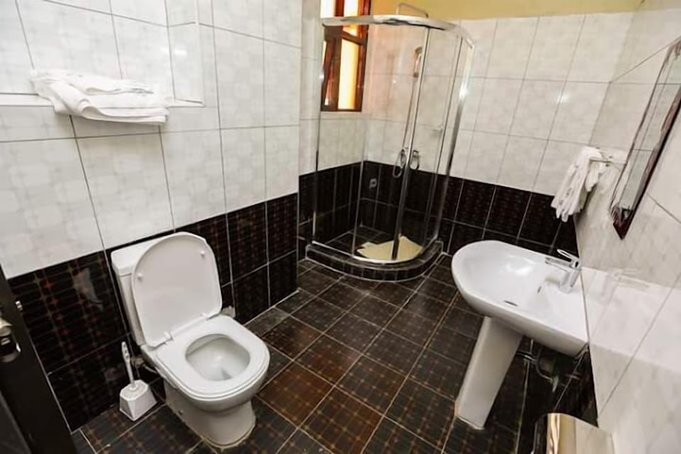 Shower, free toiletries, bathrobes, slippers