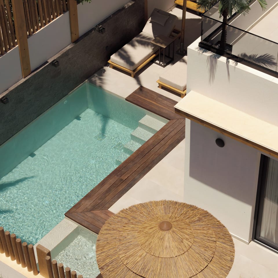 Every corner whispers luxury, every view breathes the essence of island life.