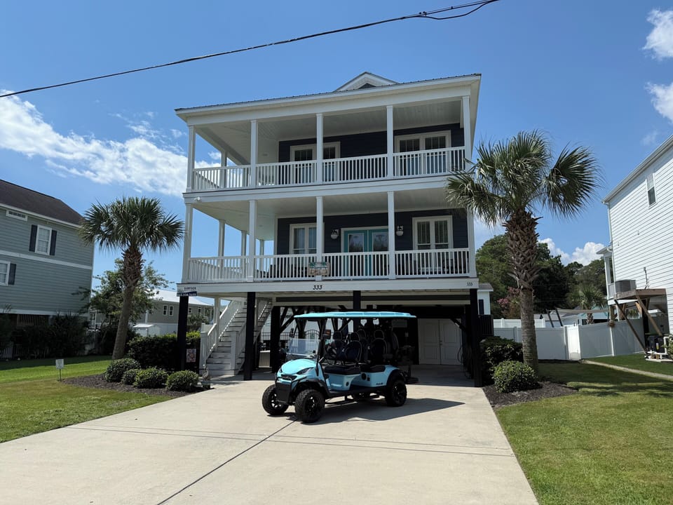 Look at this stunner! BRAND NEW LIMO golf cart included.