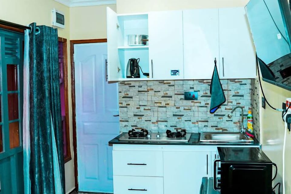 Fridge, microwave, cookware/dishes/utensils