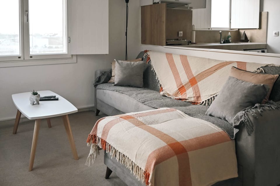 Open-Plan Lounge with Island Touches
Soft textiles and tasteful decor reflect local charm while offering all modern comforts.