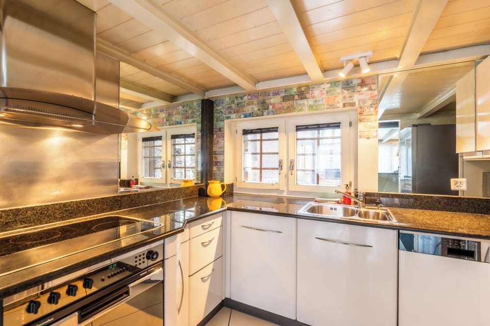 Chalet, Balcony, Courtyard View | Private kitchen | Fridge, oven, stovetop, dishwasher