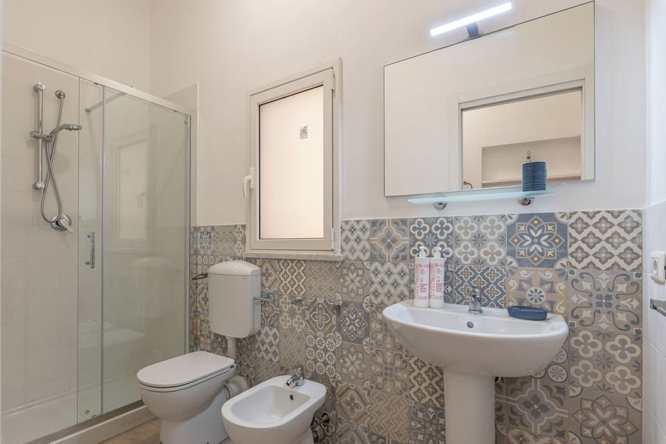 Apartment, 2 Bedrooms, Balcony | Bathroom | Shower, hair dryer, towels, soap