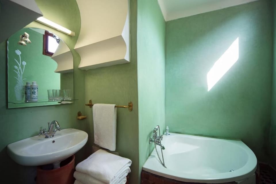 Separate tub and shower, hair dryer, towels, soap